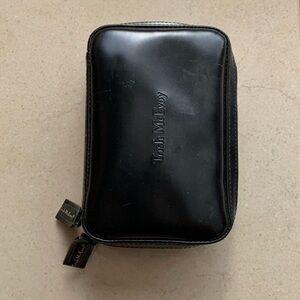 Trish McEvoy mini makeup planner with insert. Gently used. Good condition